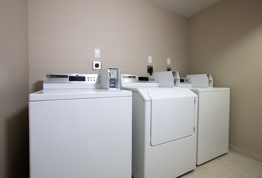 Coin operated laundry located on the 3rd floor.
