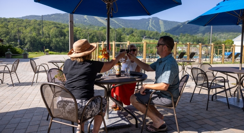 A group cheersing on Preston's patio