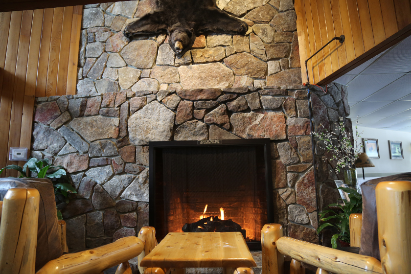 Large fieldstone fireplace in our lobby